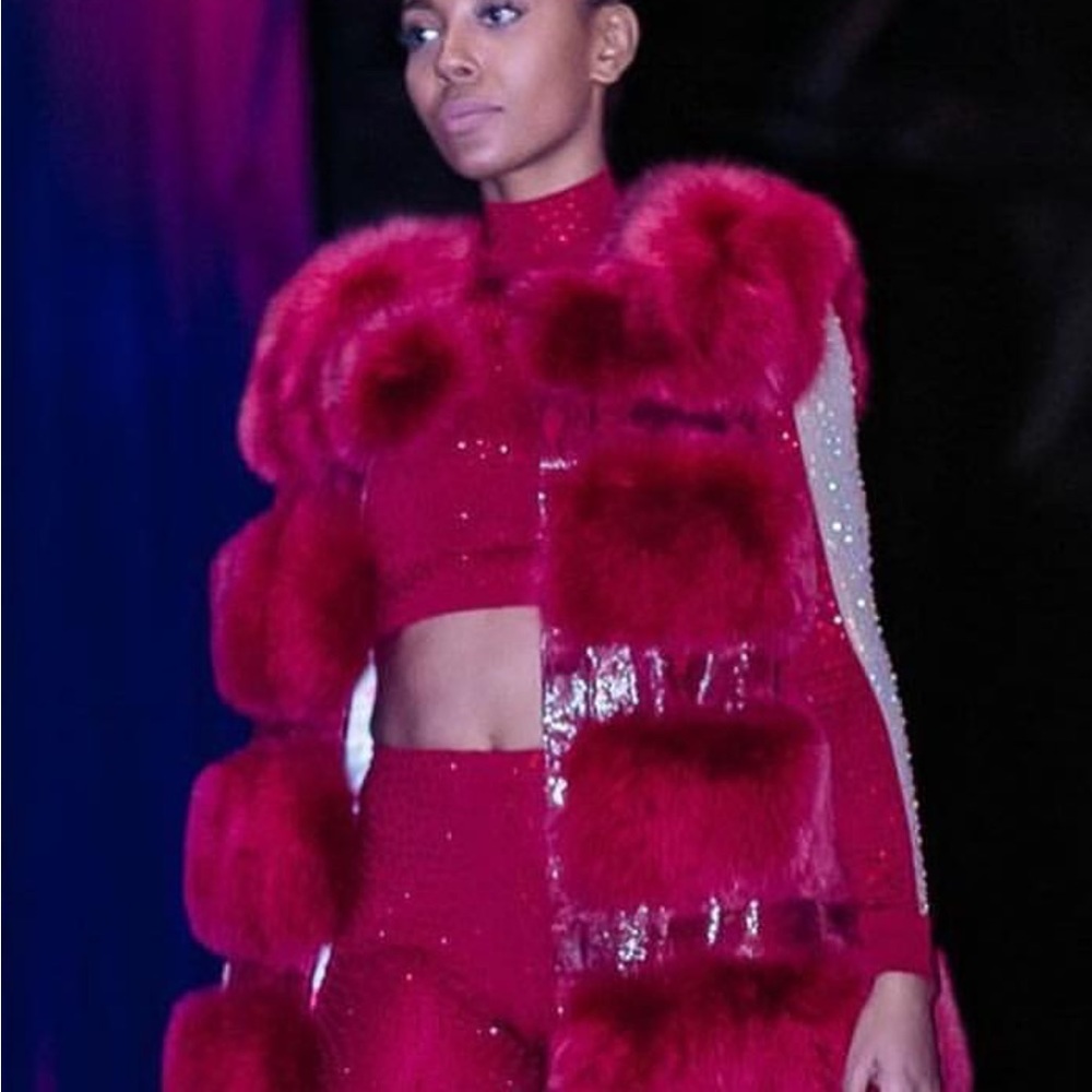 Red fox vest with snake skin inserts very rare only one was made. Real fox fur.